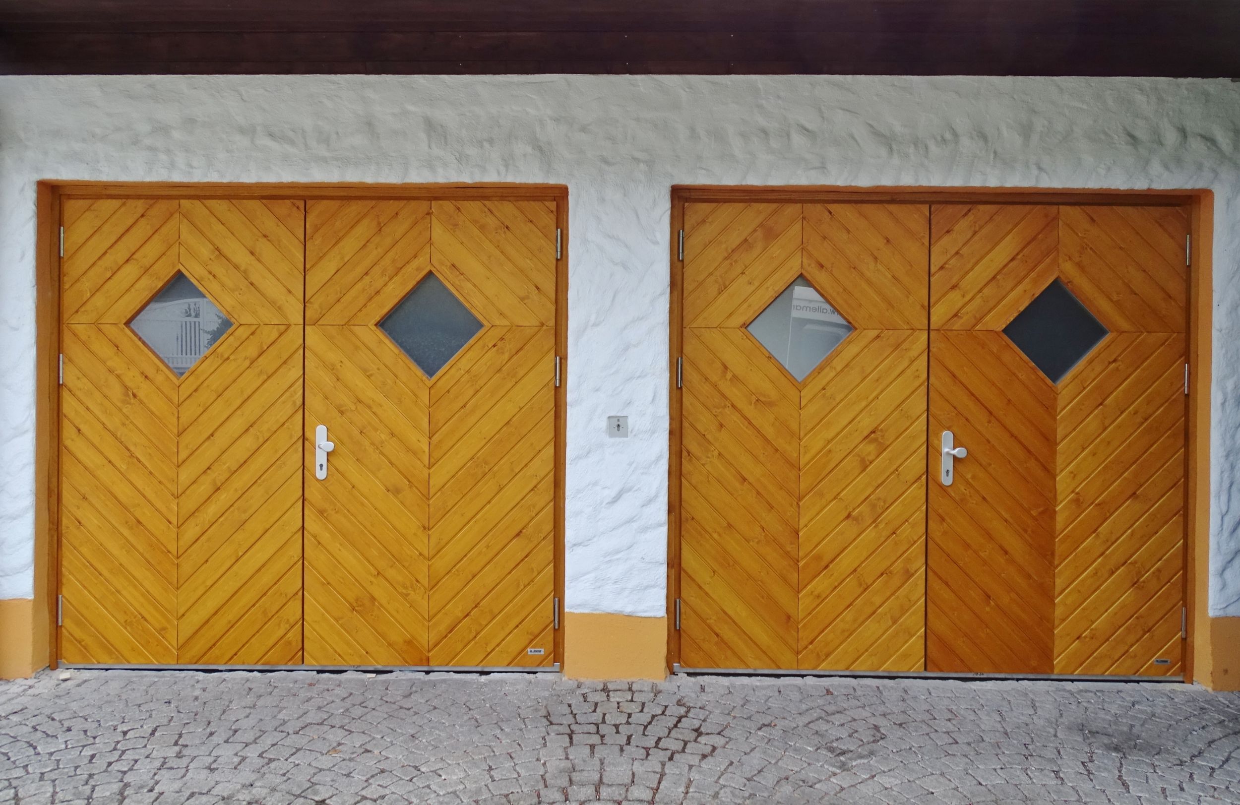Garagentore Flügeltore ALLEMANN® GmbH Holz u. Metallprodukte
